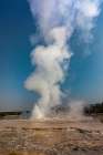 Geysers spew boiling water and steam into the air. Art Print